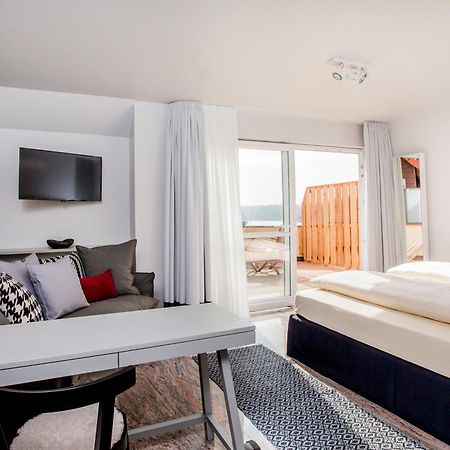 Seehotel Niedernberg - Das Dorf Am See Esterno foto