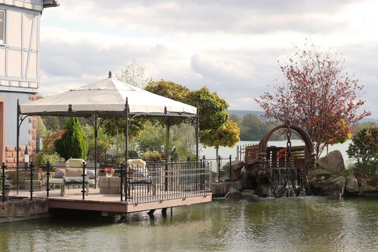 Seehotel Niedernberg - Das Dorf Am See Esterno foto