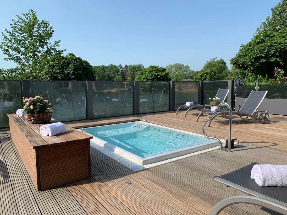 Seehotel Niedernberg - Das Dorf Am See Esterno foto