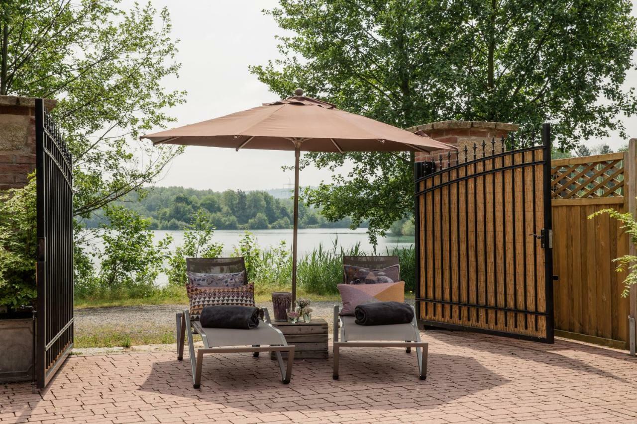 Seehotel Niedernberg - Das Dorf Am See Esterno foto